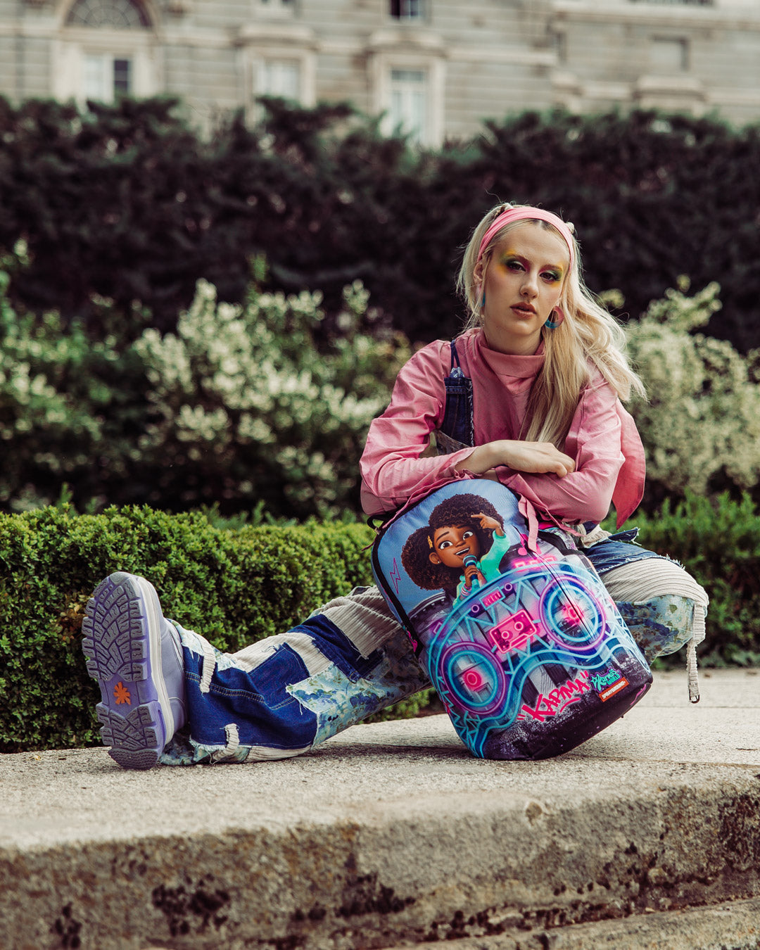 KARMA'S WORLD TURN UP THE VOLUME BACKPACK